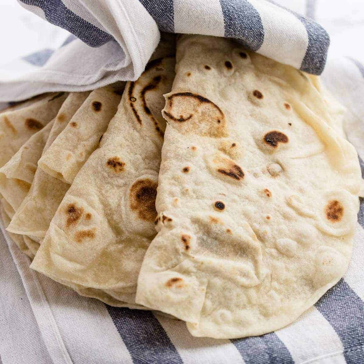 https://www.pantsdownapronson.com/wp-content/uploads/homemade-soft-flour-tortilla-recipe-17.jpg